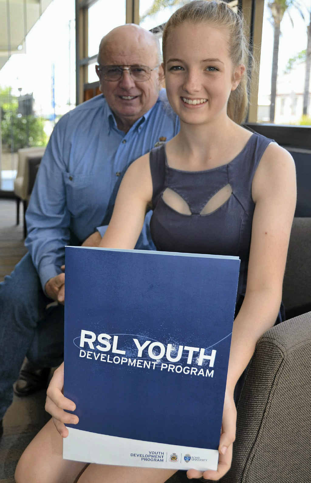 RSL Sub-branch president John Skinner and RSL Youth Development Program grant recipient Holly Woodford.